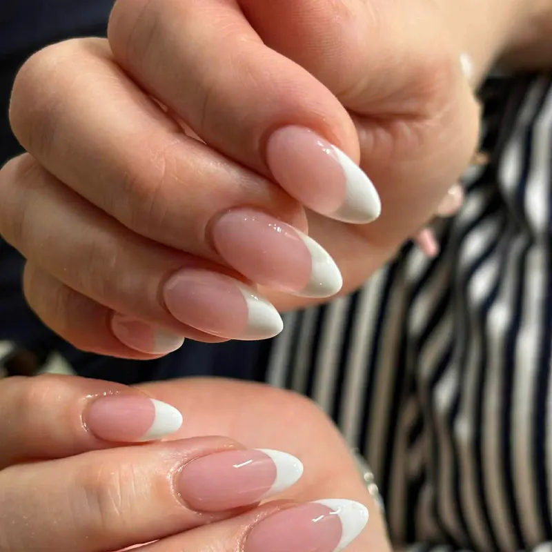 Long white French tip almond nails, Da Nang