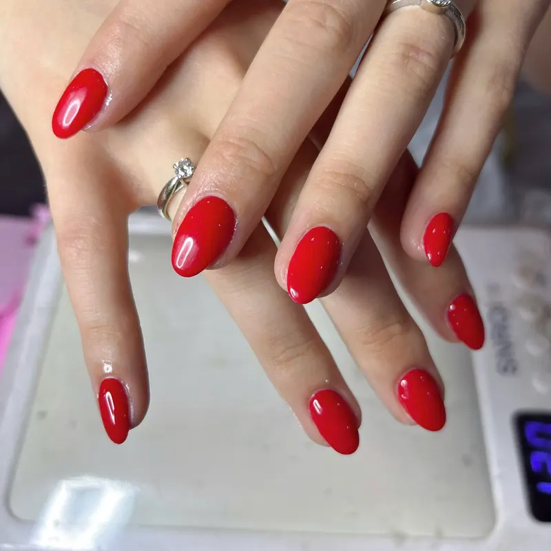 Classic red gel manicure by LENA Nails Da Nang